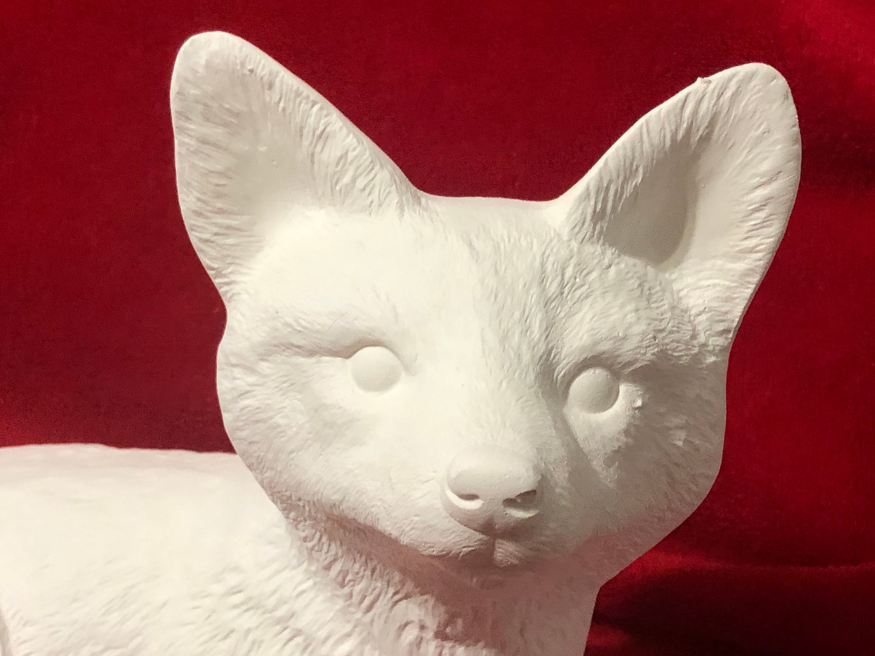 Fox Pup Lying Down from Scioto Molds in ceramic bisque ready to paint