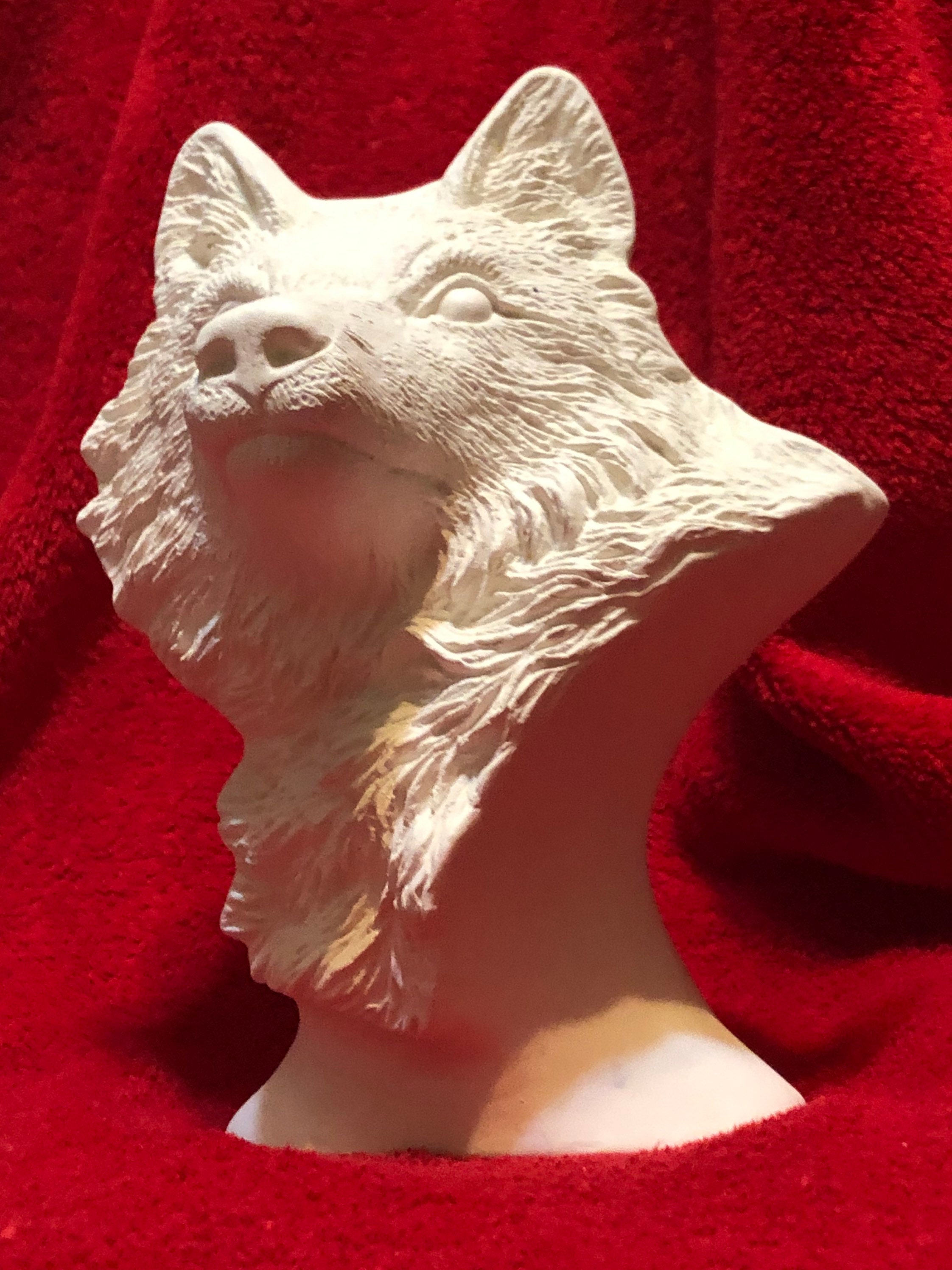 ceramic wolf statue
