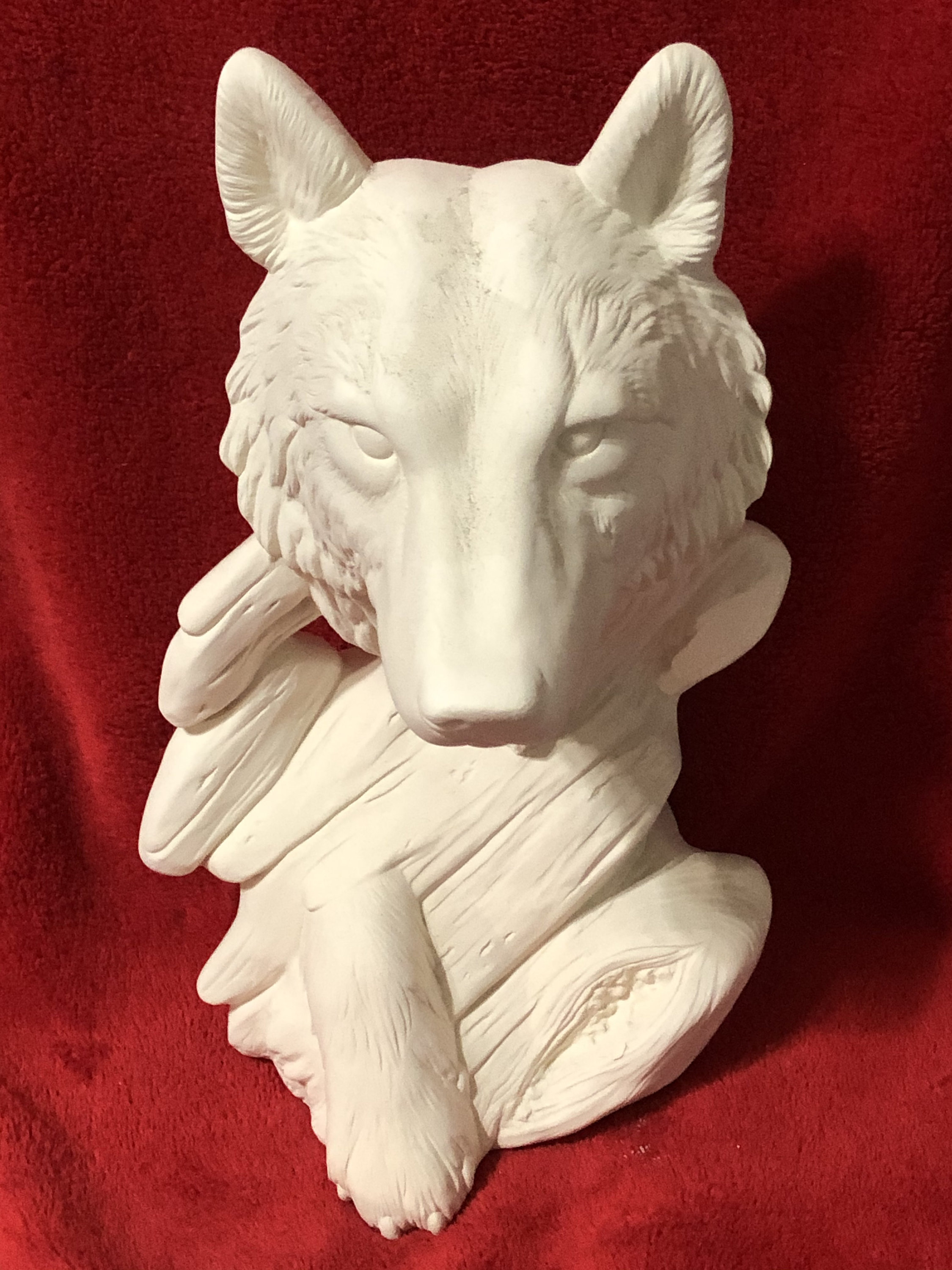ceramic wolf statue