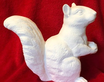 Ceramic Squirrel with Acorn in bisque ready to paint