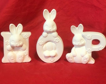 Clay Magics 3 piece Bunny Hop in ceramic bisque ready to paint by jmdceramicsart