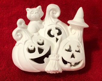 Clay Magic's Jack O Lantern Lid with cut outs in ceramic bisque ready to paint