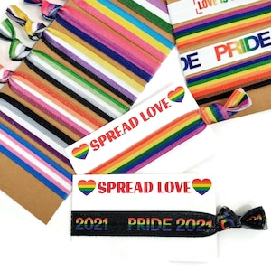 Spread Love 2 piece gift set, hand out, parade favor. Card and Bracelet included! LGBTQ + , festival, month, rainbow, flag, tie, hair tie