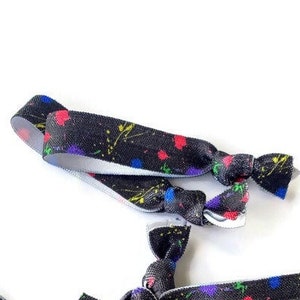 5 or 10 Paintball Hairties /Bracelets - Black Background - Great for party favors, decoration, parties, decor, valentines cards/gifts, team
