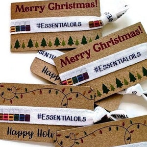 Piccolo regalo o riempitivo per calze - biglietto di auguri di buone feste con cravatta/braccialetto - oli essenziali - ottimo regalo per clienti, associati, team