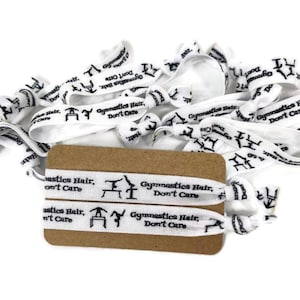 5 or 10 Hair ties /Bracelets, hairties- gymnastics hair, don&#39;t care- gymnast, dance, beam, flip, beam - White with gymnasts- great team gift