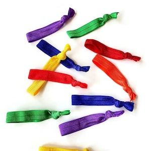 Pack of 10 Hair ties /Bracelets- PRIMARY SOLIDS set comes with a mix of solid colors- red, yellow, blue, purple, orange