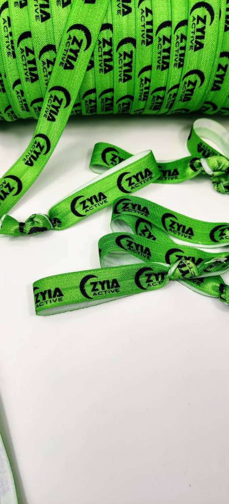 5, 10, 25, 50 ties ZYIA ACTIVE 4 colors available Black, White, Purple, Lime Green Hair ties, bracelets, elastic bands. Gift, favor image 5