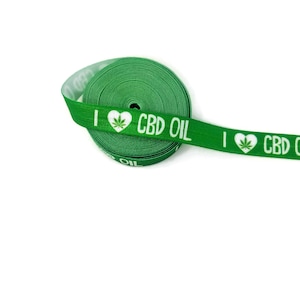 May include: Green elastic ribbon with the text "I love CBD Oil" and a green marijuana leaf inside a heart.