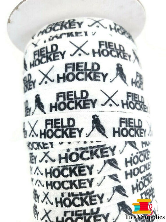 By the yard sticks Hockey Fold Over Elastic White with black puck Stretchy- great for crafts or making hair ties skates
