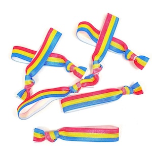 Pulseras / corbatas de pelo a rayas rosas, azules y amarillas - Ideal para desfiles, favores, tarjetas/ regalos- payaso, circo, pan, orgullo, bandera pan