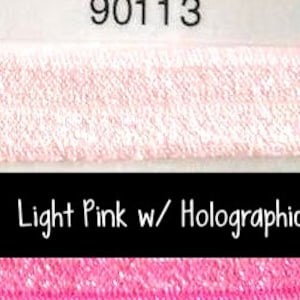 May include: Two swatches of elastic fabric. The top swatch is light pink with a subtle shimmer. The bottom swatch is a brighter pink with a holographic finish. The text "Light Pink w/ Holographic" is printed on a black label.