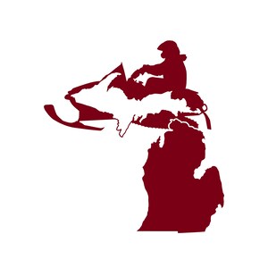 May include: A red silhouette of a snowmobile driving over the state of Michigan. The snowmobile driver is wearing a helmet.