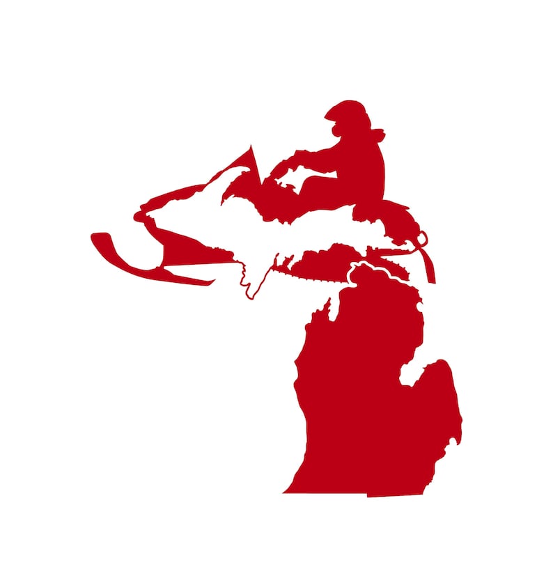 May include: A red silhouette of a snowmobile driving over the state of Michigan. The snowmobile driver is wearing a helmet.