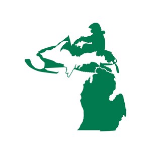 May include: A green silhouette of the state of Michigan with a snowmobile and rider on top. The snowmobile is facing left and the rider is wearing a helmet.