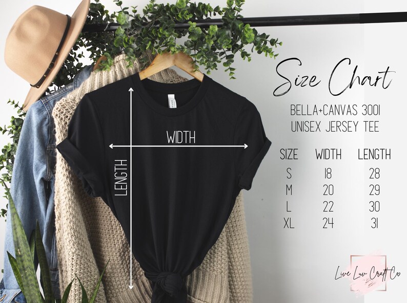 May include: A black Bella+Canvas 3001 unisex jersey tee shirt hanging on a wooden hanger. The image includes a size chart with measurements in inches: S (18x28), M (20x29), L (22x30), XL (24x31). A tan hat and denim jacket are also visible.
