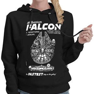 May include: Black hooded sweatshirt with a white graphic of the Millennium Falcon spaceship. The graphic includes the text "Millennium Falcon", "YT-1300 Light Freighter", "Max Speed: 1,050 km/h", "Quadrex Power Core", and "The Fastest ship in the galaxy!"