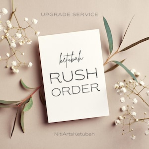 May include: White card with black text that reads "ketubah RUSH ORDER" and "NitiArtsKetubah" at the bottom. The card is surrounded by white flowers and green leaves.