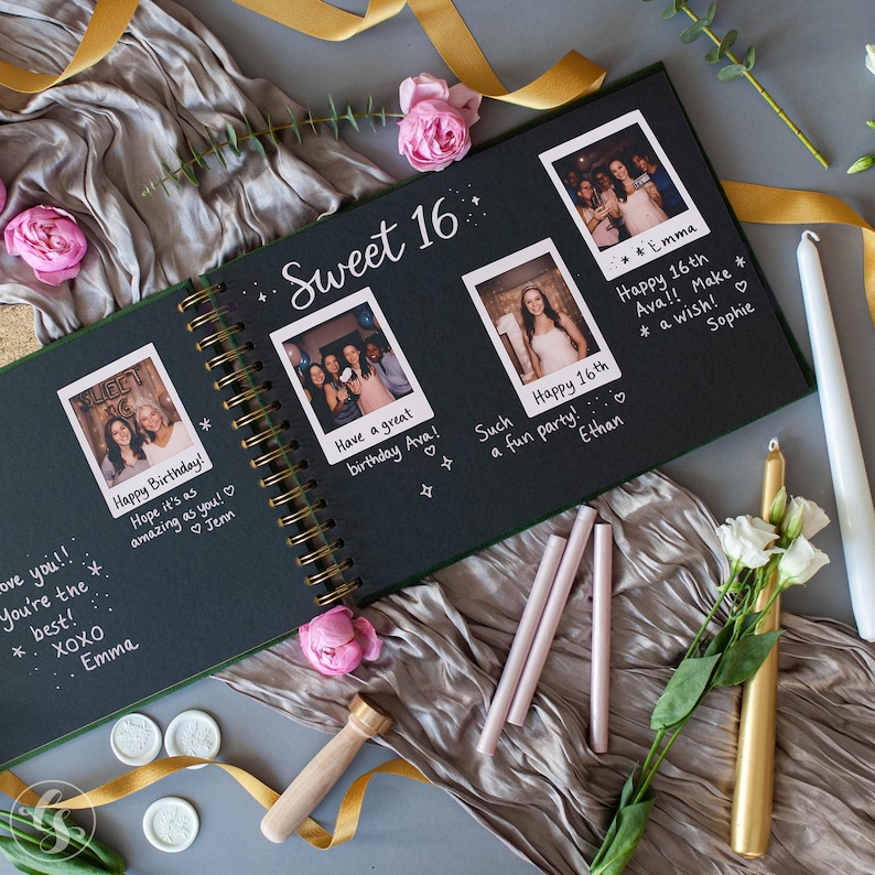 May include: An open black scrapbook with the words "Sweet 16" in white. The scrapbook contains photos and handwritten messages. Pink roses, candles, and ribbons surround the scrapbook, creating a celebratory atmosphere.