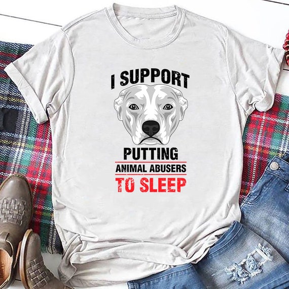 Putting a shirt cheap on a dog