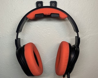 Soporte de pared para auriculares/audífonos
