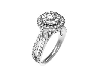 May include: A silver ring with a large round diamond surrounded by smaller diamonds. The ring has a double band with diamonds on both bands.