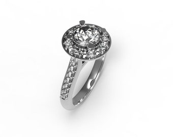 May include: A silver engagement ring with a large round diamond center stone surrounded by a halo of smaller diamonds. The band is also set with smaller diamonds.