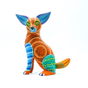Alebrije wood carvings Oaxaca México lynx cat mexican folk art sculpture by Saulo Mandarín