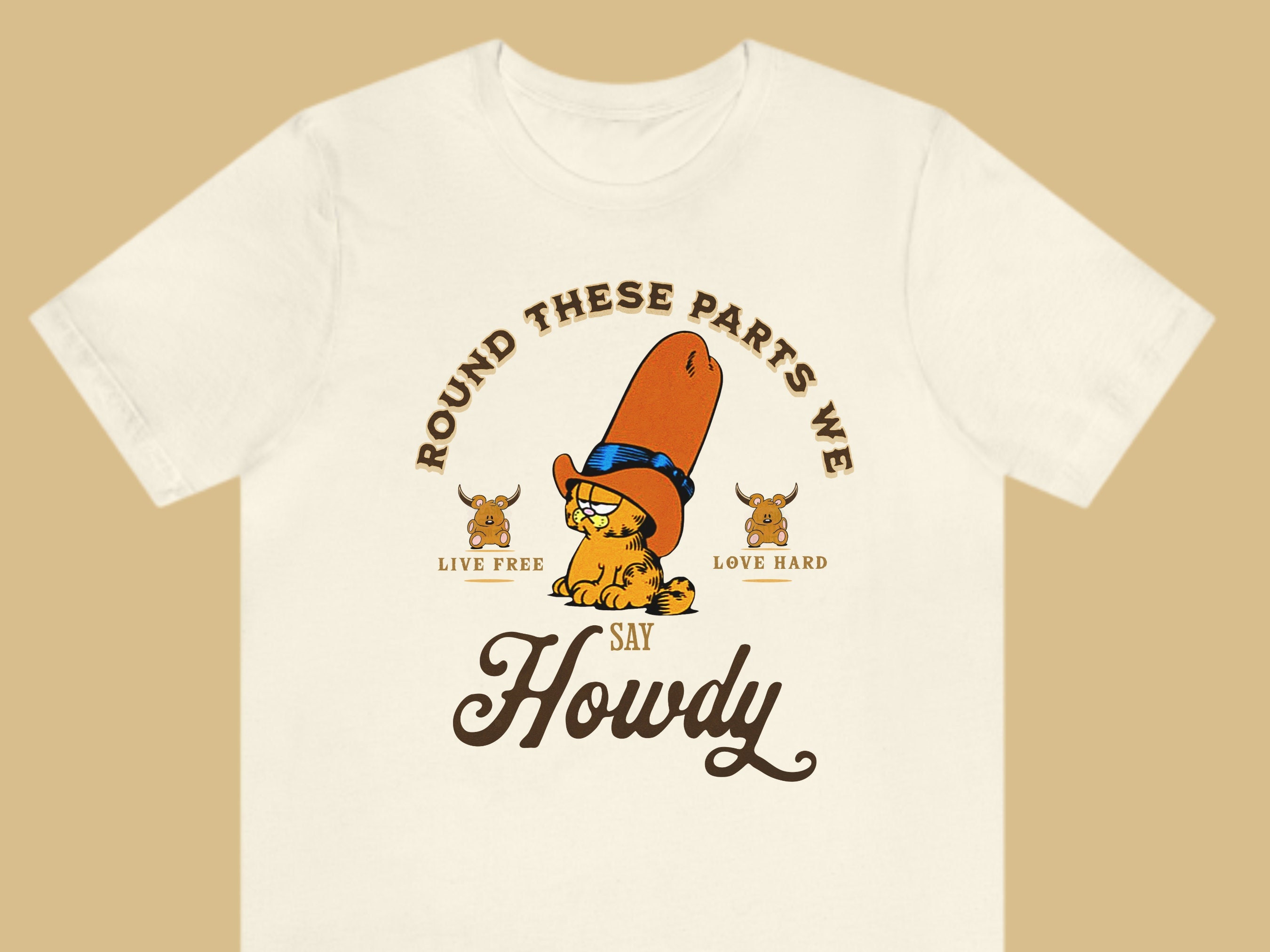 Discover Garfield, Round these parts we say Howdy, Garfield Cowboy T-Shirt