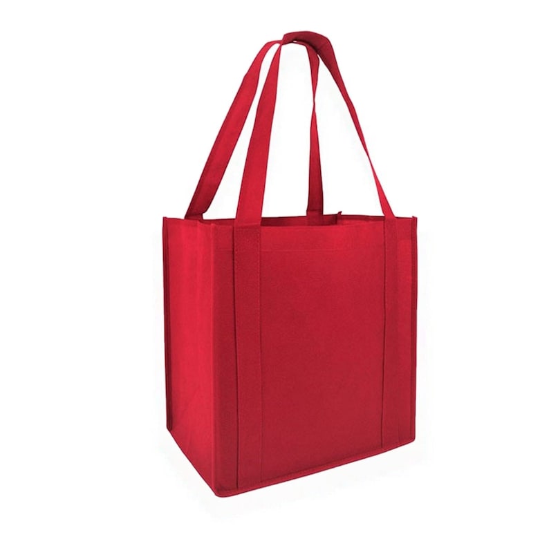 May include: A red reusable shopping tote bag with two handles. The bag is made of a thick, durable fabric.