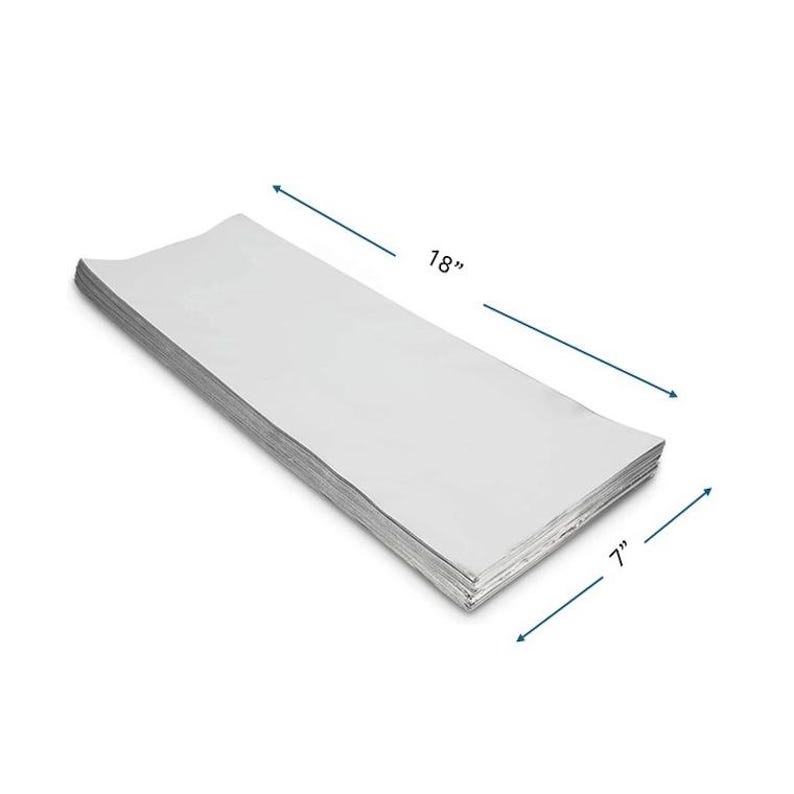 May include: A stack of white paper sheets measuring 18 inches by 7 inches.