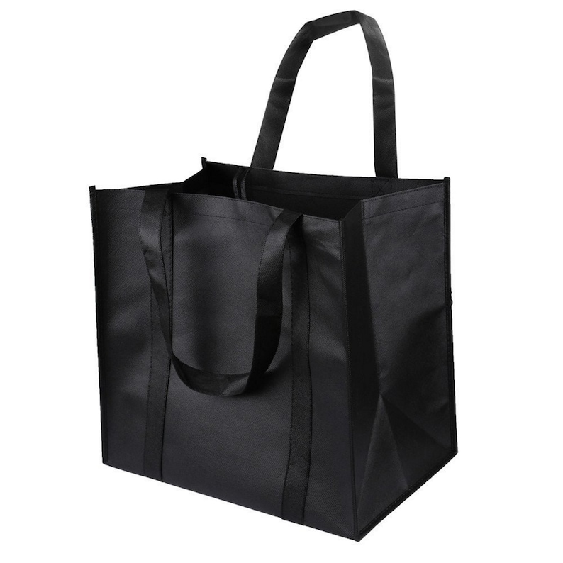 May include: A black reusable tote bag with two handles. The bag is made of a durable fabric and has a large capacity.