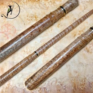 Curly mango wood magic wand with ebony and brass center ring - beautiful chatoyance effect