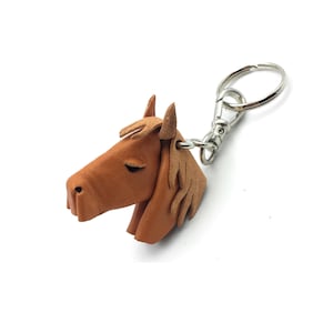 franartPiel - Portachiavi fatto a mano con testa di animale in vera pelle Ubrique (Levriero, Boxer, Stambecco, Cervo, Scimmia, Gallo, Cavallo)