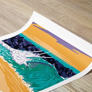May include: A retro-style illustration of a large wave breaking over a rocky jetty. The wave is a vibrant turquoise and white, with a yellow sandy beach in the foreground. The sky is a gradient of orange, yellow, and purple. The text "The Wedge" is visible in the lower left corner.