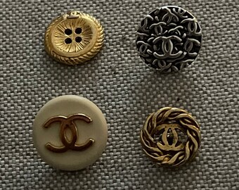 set of 4 different vintage buttons