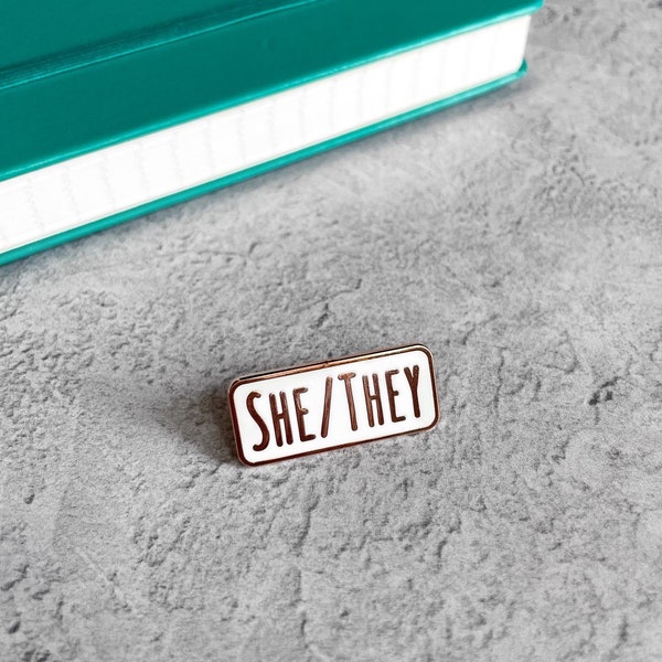 She/They Pronoun Hard Enamel Pin Badge - Black and Gold or White and Gold