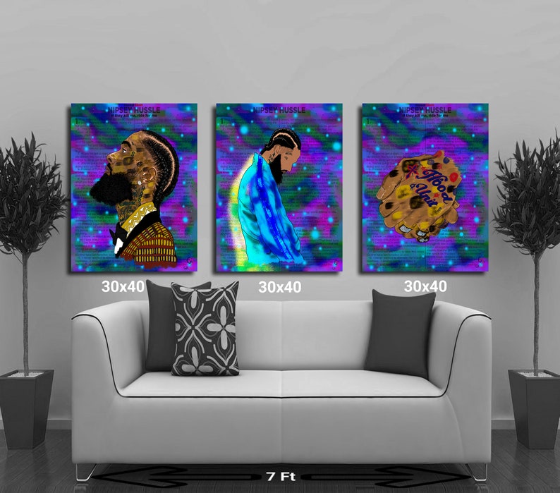 May include: Three 30x40 inch canvas prints featuring a portrait of rapper Nipsey Hussle. The first print shows Hussle in a black tuxedo with a bow tie, the second print shows Hussle in a blue jacket, and the third print shows a hand with the words "Hood & Unit" written on it.