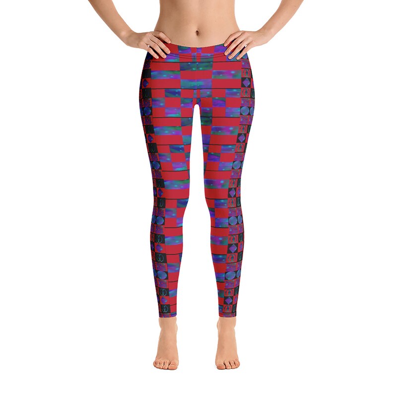 May include: Red, blue, and black patterned leggings with a geometric design.