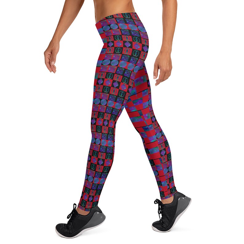 May include: Red and blue patterned leggings with a geometric design. The leggings are made of a stretchy, comfortable fabric and are perfect for yoga, running, or any other workout.