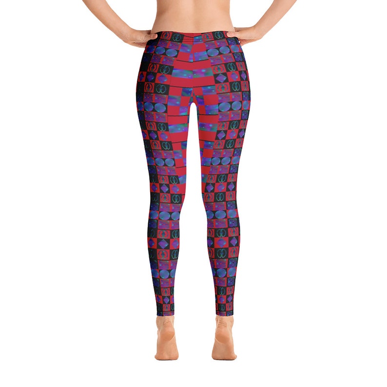 May include: Red, blue, and black patterned leggings with a geometric design. The leggings are made of a stretchy, comfortable fabric.