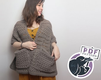May include: A woman wearing a brown crochet shawl with large pockets. The shawl has a lacy pattern and is worn over a yellow striped top. The text "PDF PATTERN" is visible in the image.