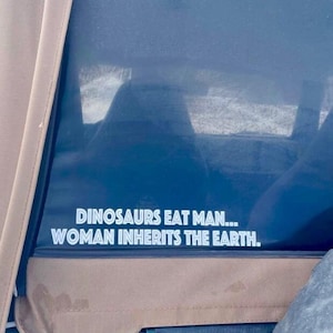 Dinosaurs eats man...Woman inherits the earth.&quot; Vinyl Decal