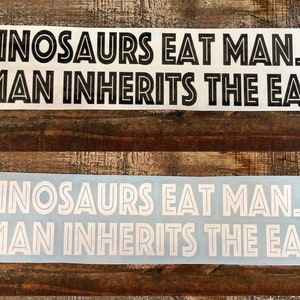 Dinosaur eats man...Woman inherits the earth." Vinyl Decal