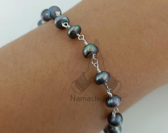 Pulsera de perlas negras de pavo real, joyería artesanal de plata de ley con perlas de agua dulce.