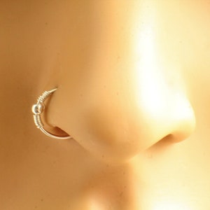 How to take out hoop nose ring with deals ball
