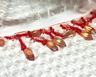 42" of lamp fringe with crystal-like beads in red and rosaline pink
