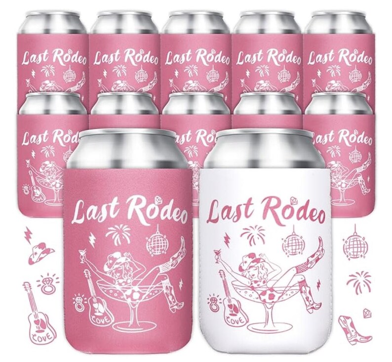 May include: A collection of pink and white can coolers with the text "Last Rodeo" in a script font. The coolers feature a cowgirl illustration in a martini glass, with additional graphics of a guitar, cowboy hat, and disco ball.