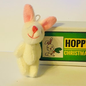 Carte de voeux Hoppy Christmas - Lapin dans une boîte
