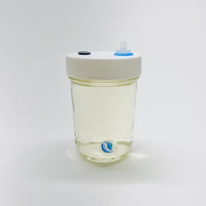 Mushroom Liquid Culture Solution - Sterilized Half Pint Jar with Marble